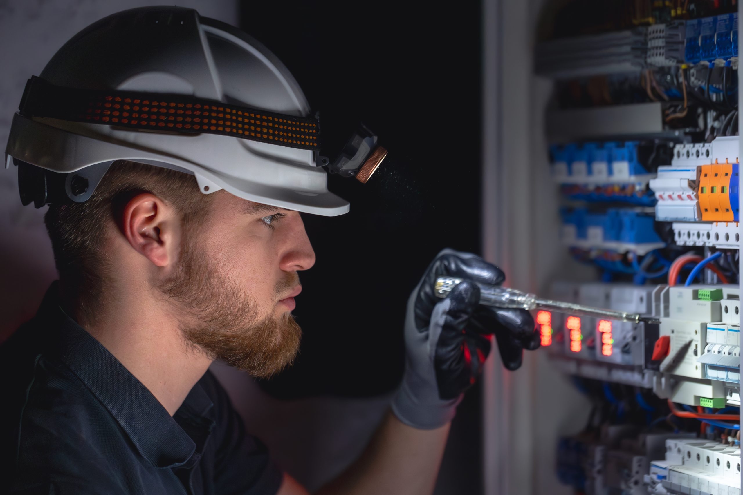 A,Male,Electrician,Works,In,A,Switchboard,In,Overalls,Against
