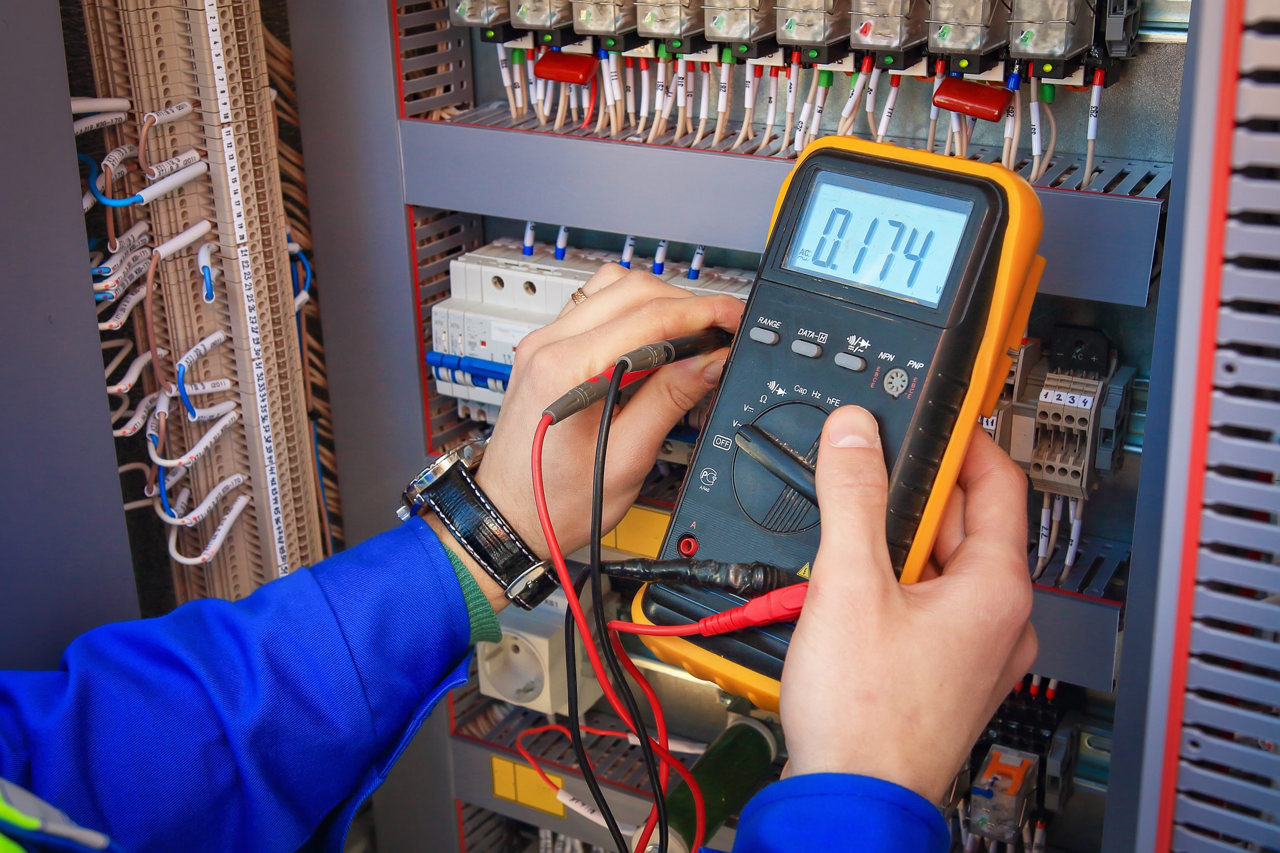 Electrical,Engineer,Adjusts,Electrical,Equipment,With,A,Multimeter,In,His